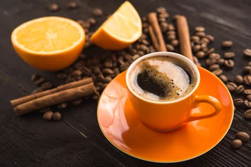 Fotobehang coffee cup with orange fruit © dimasobko