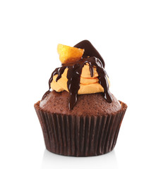 Tasty cupcake with slice of mandarin and chocolate, isolated on white