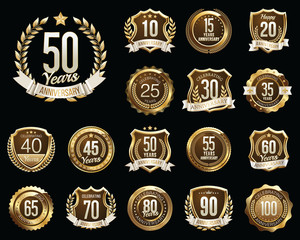 Set of Golden Anniversary Badges. Set of Golden Anniversary Signs.
Gold and Brown. 
