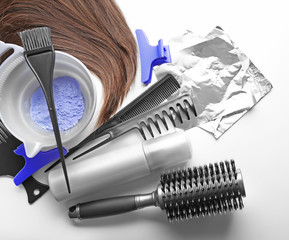 Barber set with strand, tools and hair dye, isolated on white