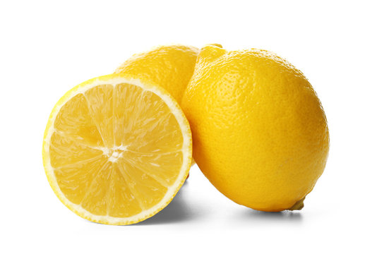 Fresh lemons with half isolated on white