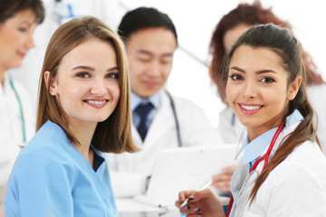 Fototapeta premium Portrait of smiling doctors indoors