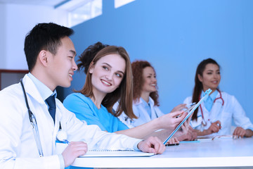 Team of doctors at working place indoors