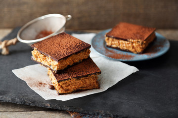 Few delicious chocolate cakes on slate plate