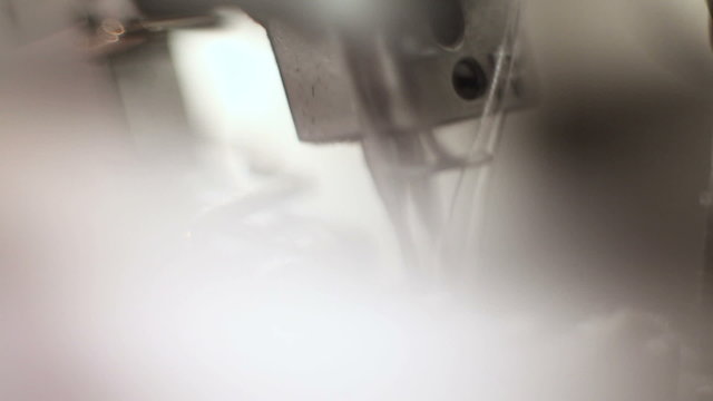 Close-up of working sewing machine