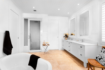 Bathroom of luxury house having empty bath tub