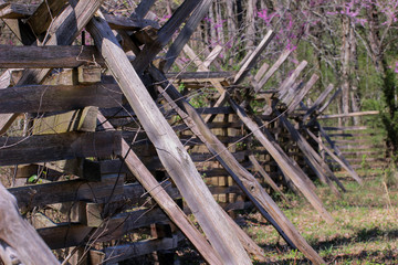 Wood fence built on battlefield in southern countryside