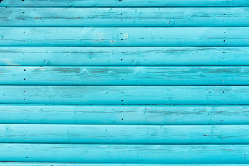 Section of turquoise panelling from a beach hut, suitable for backgrounds of beach, seaside and summer holiday themes. - obrazy, fototapety, plakaty