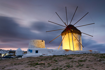Old traditional windmills over the town of Mykonos.
