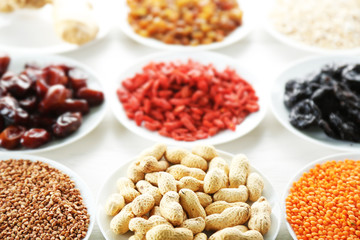 Raw diet food on a light wooden background