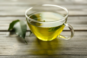 Cup of tea on wooden table