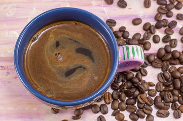 Coffee cup and coffee beans