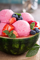 Refreshing berry sorbet served in watermelon