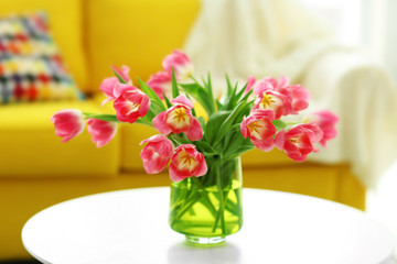 Fresh bouquet of tulips on a coffee table