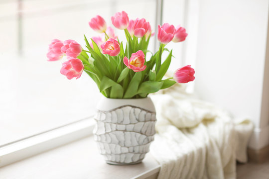 Fresh bouquet of tulips on a windowsill