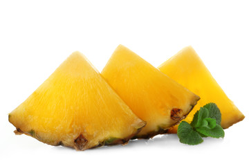 Juicy pineapple slices with fresh mint, isolated on white