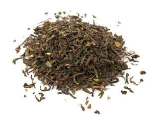 Loose dried darjeeling black tea leaves over white background