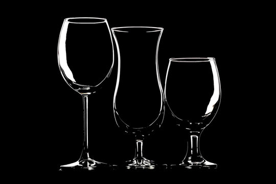 Glasses for wine, beer and cocktail on black background
