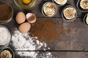 Muffins and ingredients on the table