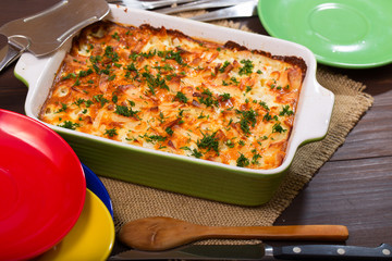 Potatoes baked in sour cream and tableware