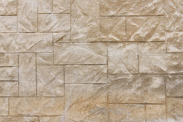 Modern beige stone wall background texture