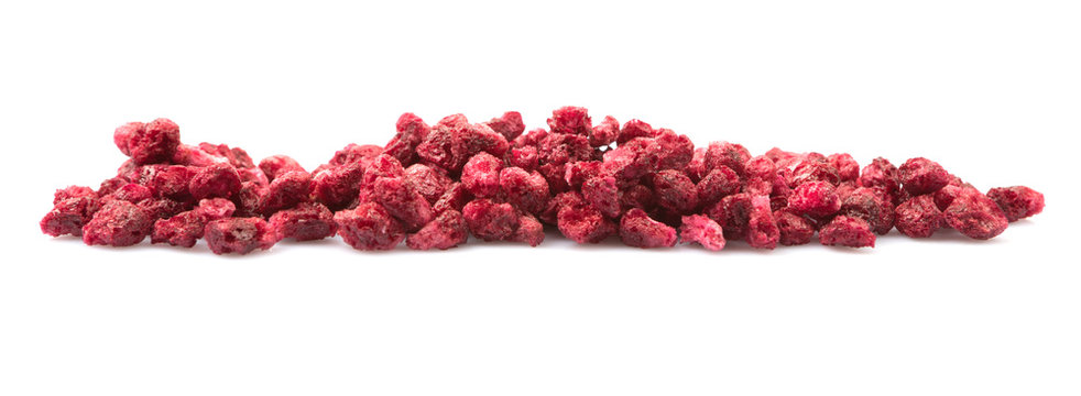 Dried pomegranate seeds over white background