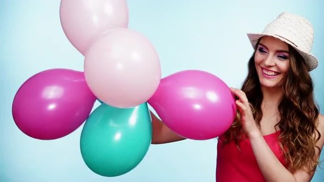Woman summer joyful girl with colorful balloons 4K