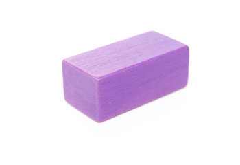 piece of purple wooden toy block on white background
