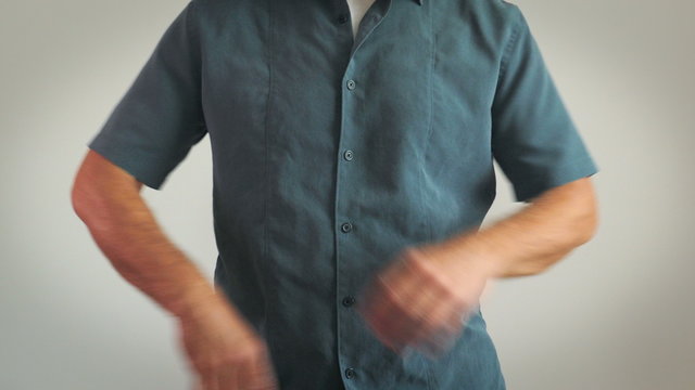 4K: Man Standing Doing Random Hand Motions