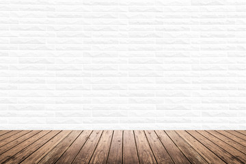 interior room with brick wall and wood floor