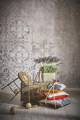 grey wall paper modern stool and pillow