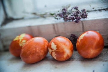 colorful Easter eggs on rustic background