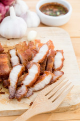Fry pork on chopping block