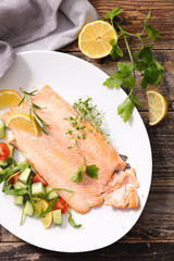 baked fish and salad