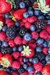 Group of blueberries, raspberries, blackberries and strawberries