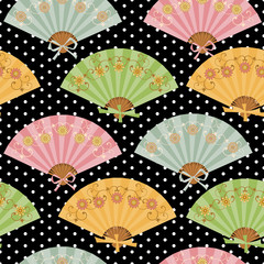 Multi-colored fan with flower pattern in Oriental style.