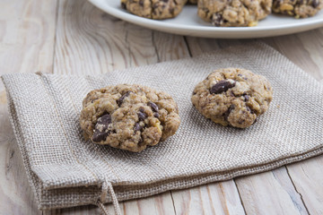 Oat and peanut butter cookies with pumpkin seeds and cinnamon