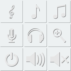 Musical icons and buttons on a light background with a shadow. 