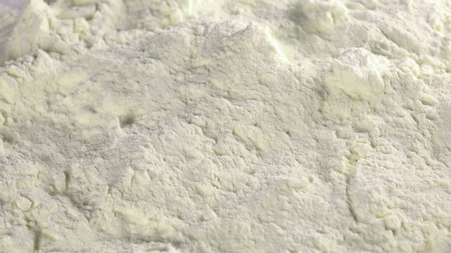 Portion of rotating Milk Powder as not loopable 4K footage