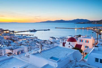 Wall murals Mediterranean Europe View of Mykonos town and Tinos island in the distance, Greece.