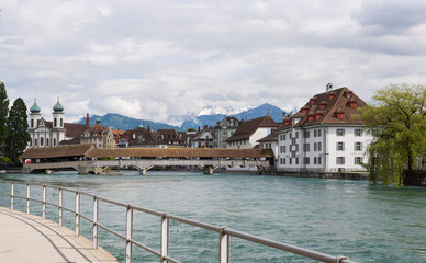 Lucerne Switzerland with Reuss River and alps
