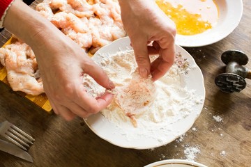 Raw chicken fillet in flour