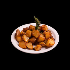 Backed potatoes on black
