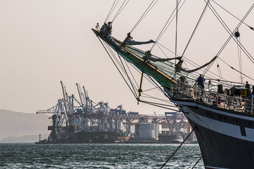 sailboat moored to a pier in the port of Vladivostok