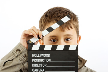 Boy with movie clapper board