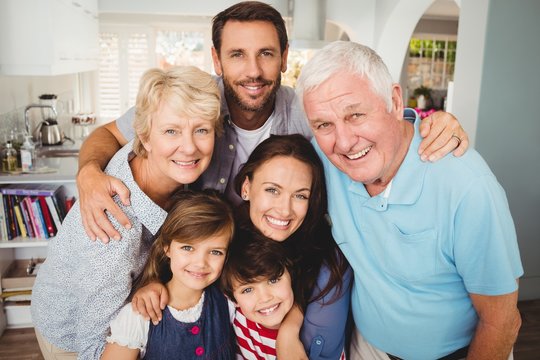 Portrait of smiling family with grandparents