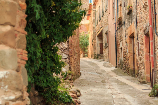 Fototapeta Deserted ancient street in medieval village