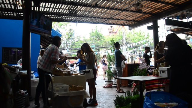 Thai merchant prepare and setting shop for sale traveller at market fair  on March 19, 2016 in Bangkok, Thailand.