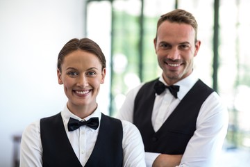 Waiting staff smiling at camera