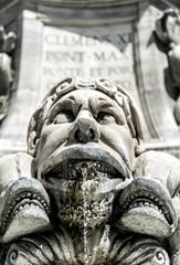 Old sculpture in the square in Rome, black an white
